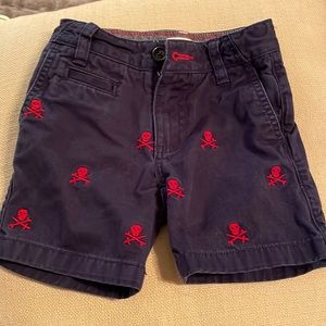 Mini Boden Chinos 4y with embroidered red skull and crossbones.
